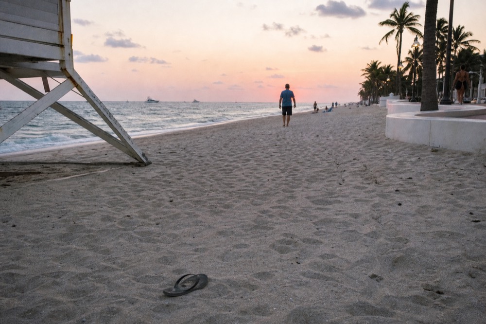 Fort Lauderdale beach at sunset with boats in the distance, no text, no logos, no people